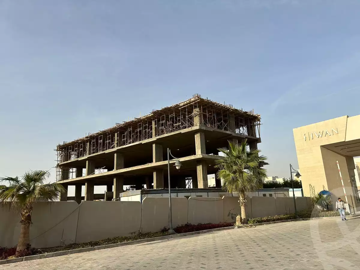 https://aqarmap.com.eg/en/listing/5356575-for-sale-cairo-el-sheikh-zayed-city-compounds-the-trine-iwan