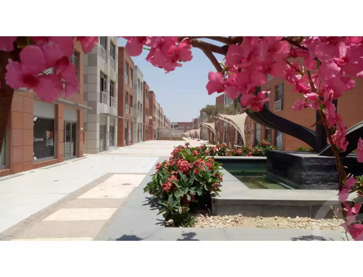 https://aqarmap.com.eg/ar/listing/5591602-for-sale-cairo-el-sheikh-zayed-city-compounds-the-courtyard-mall-dorra