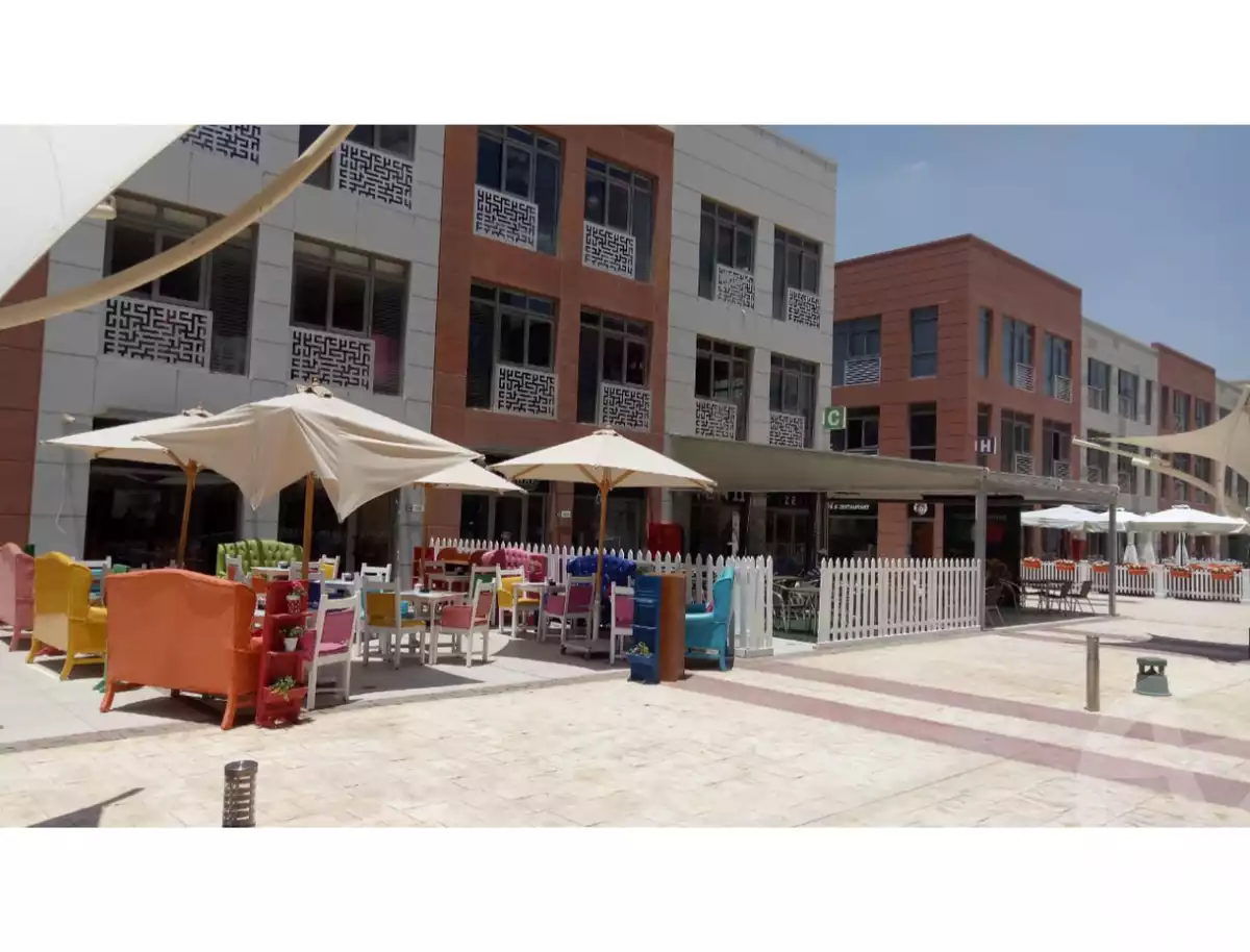 https://aqarmap.com.eg/ar/listing/5684024-for-sale-cairo-el-sheikh-zayed-city-compounds-the-courtyard-mall-dorra