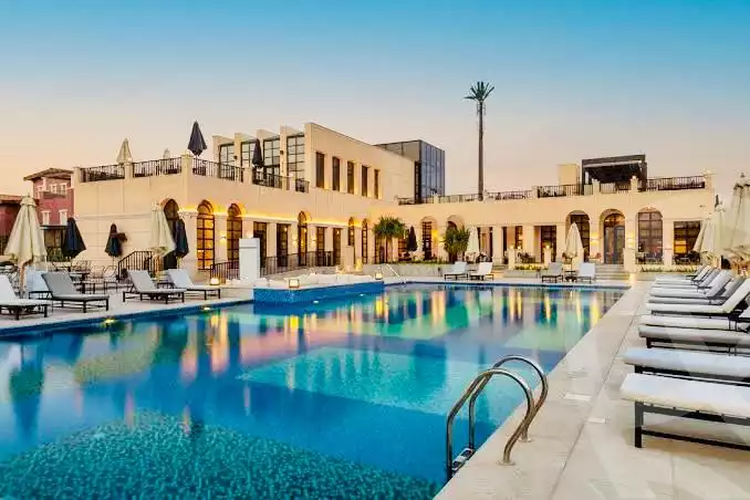 https://aqarmap.com.eg/ar/listing/6368448-for-sale-cairo-6th-of-october-compounds-ramo