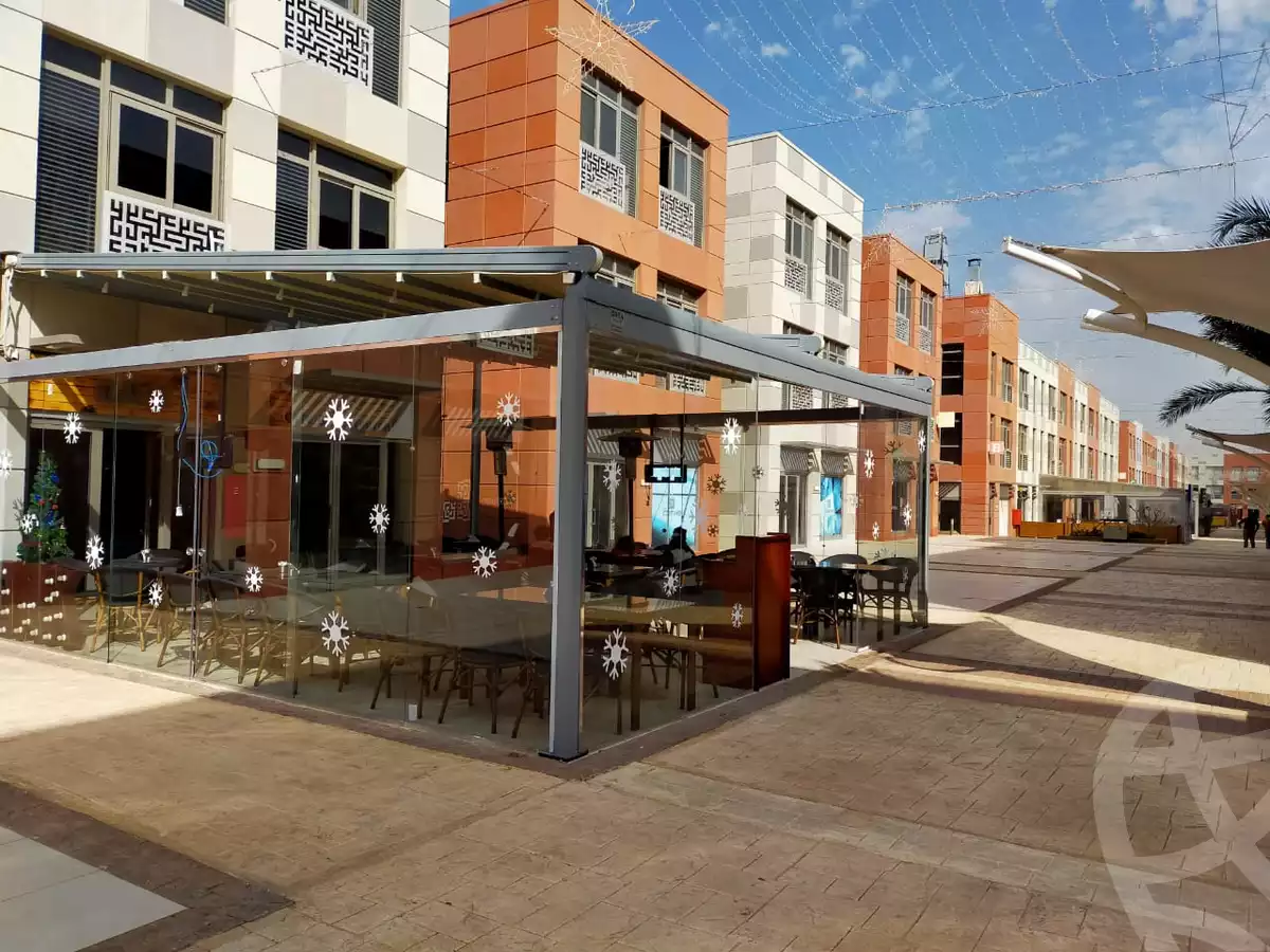 https://aqarmap.com.eg/ar/listing/6563457-for-sale-cairo-el-sheikh-zayed-city-compounds-the-courtyard-mall-dorra