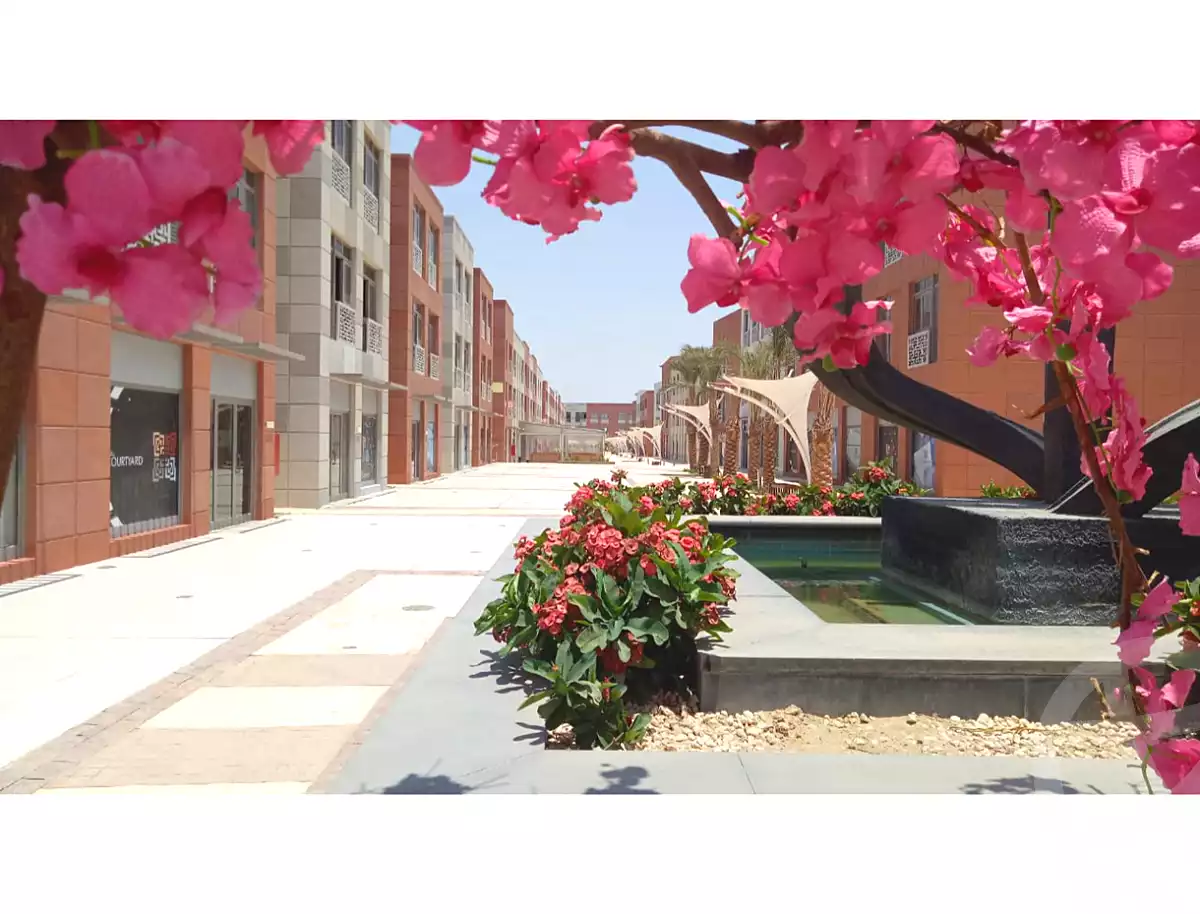 https://aqarmap.com.eg/ar/listing/6663177-for-sale-cairo-el-sheikh-zayed-city-compounds-the-courtyard-mall-dorra
