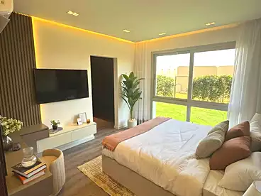 Apartment with Garden For sale in Mar Ville Compound - AlMarasem, Expansion Of El Sheikh Zayed City, 166 sqm