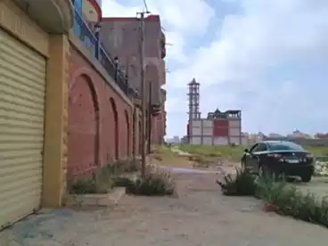 Land For sale in El Kilo 21, Al Agamy, 300 sqm