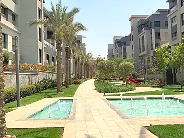 Duplex with Garden For sale in Trio Gardens Compound - M Squared, Compounds in New Cairo, 230 sqm